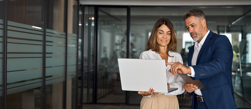 coworkers laptop office